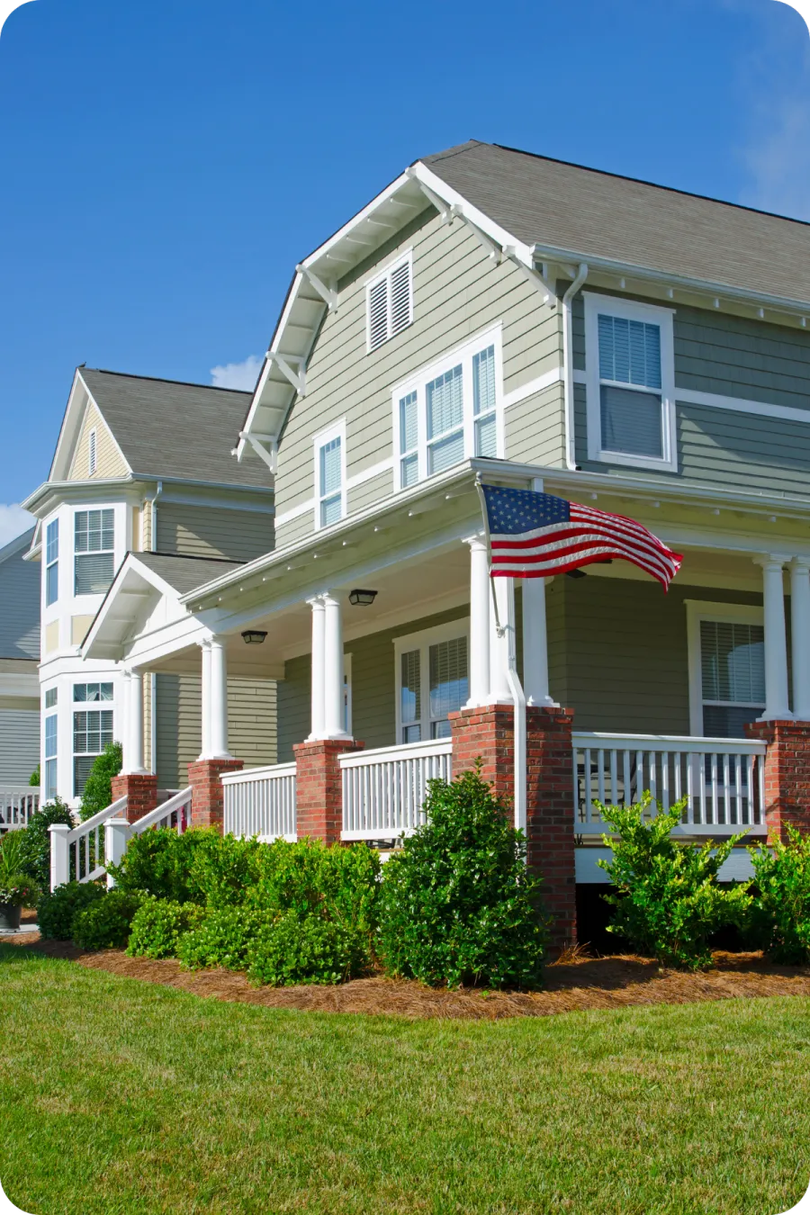 Front view of a well-maintained Dundee, FL home with American flag — symbolizing trusted local home inspection.