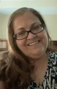 Wanda Figueroa, office manager at A.C.F. Home Inspections in Orlando, FL, ensuring smooth scheduling and client care.